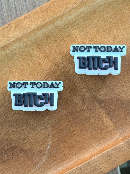 Funny silicone focal bead featuring the phrase “Not Today Bitch” displayed on a wooden tray. Ideal for beadable pens, keychains, wristlets, badge reels, lanyards, and custom DIY crafting projects.