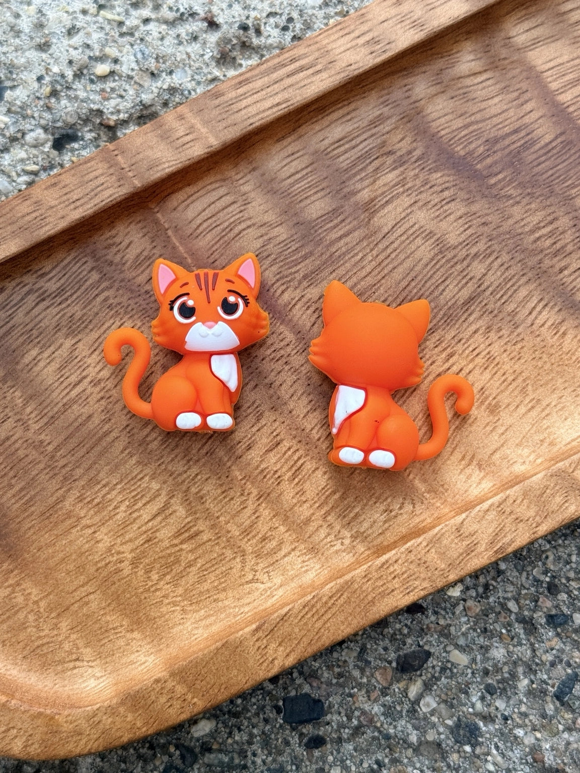 Orange tabby cat silicone focal bead featuring a detailed 3D kitten design for DIY keychains, wristlets, badge reels, beadable pens, lanyards, and handmade craft projects.