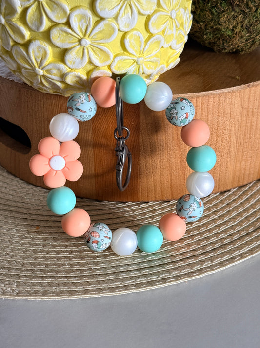 FSOH silicone wristlet keychain with peach, mint, and floral beads featuring soft pastel spring design
