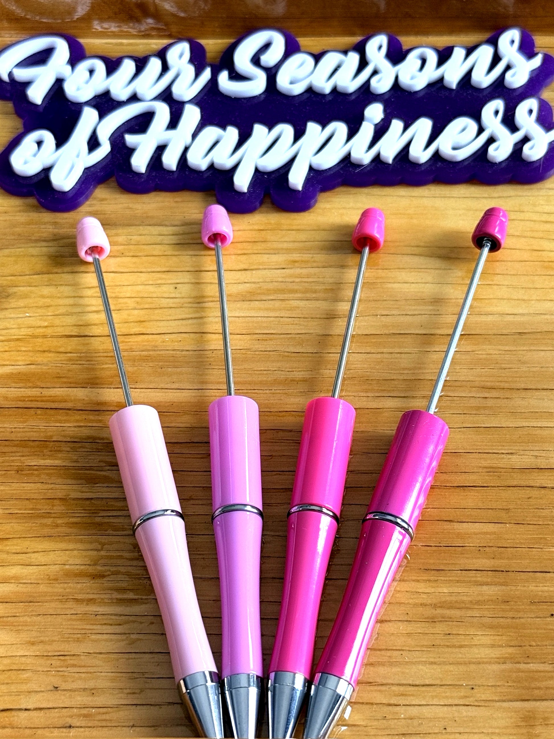 Pink beadable pens from Four Seasons of Happiness for DIY beaded pen crafting with silicone beads and customizable pen bases