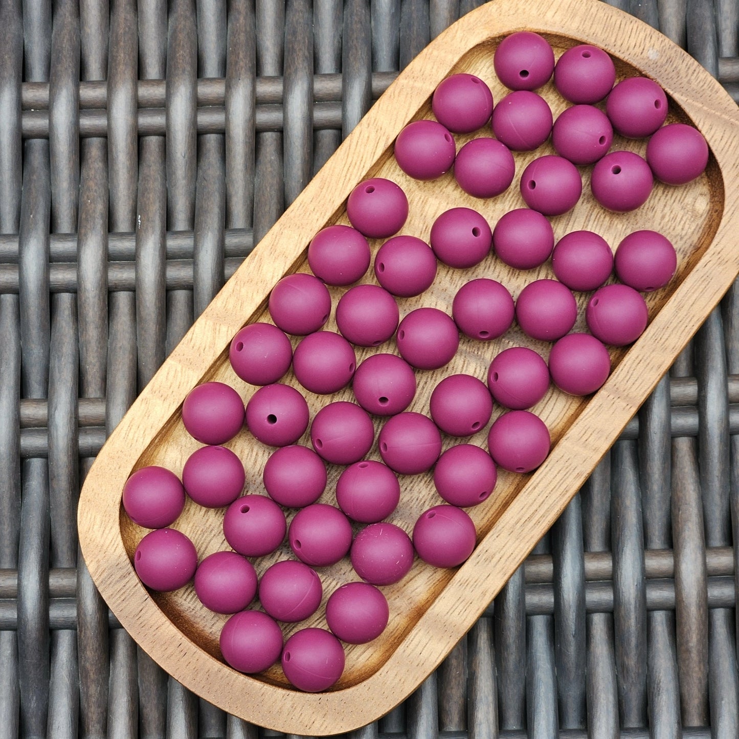 Plum Passion 15mm premium plum purple silicone round beads by Four Seasons of Happiness. BPA-free silicone craft beads available in 1, 15, 30, 60, and 120 count options for beadable pens, wristlets, keychains, badge reels, bookmarks, zipper pulls, and DIY craft projects.