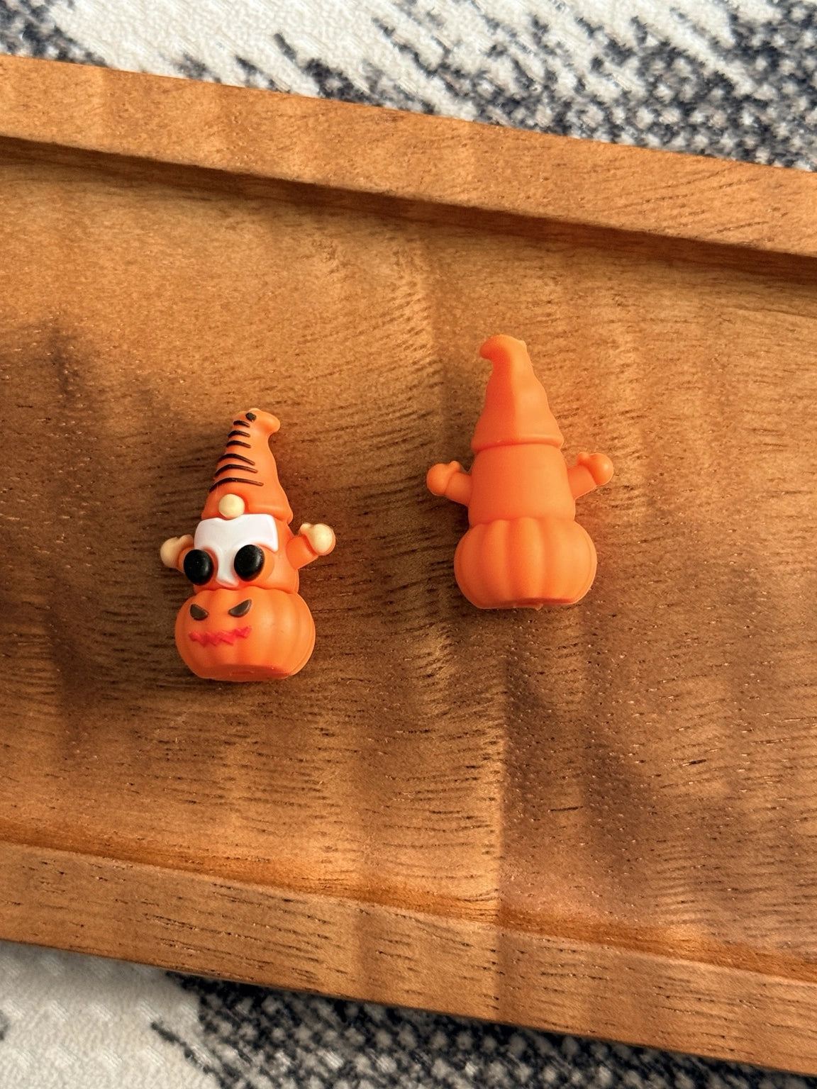Orange 3D Halloween gnome silicone focal bead with black glasses, a white beard and pumpkin body for pens, keychains, wristlets and fall crafts.