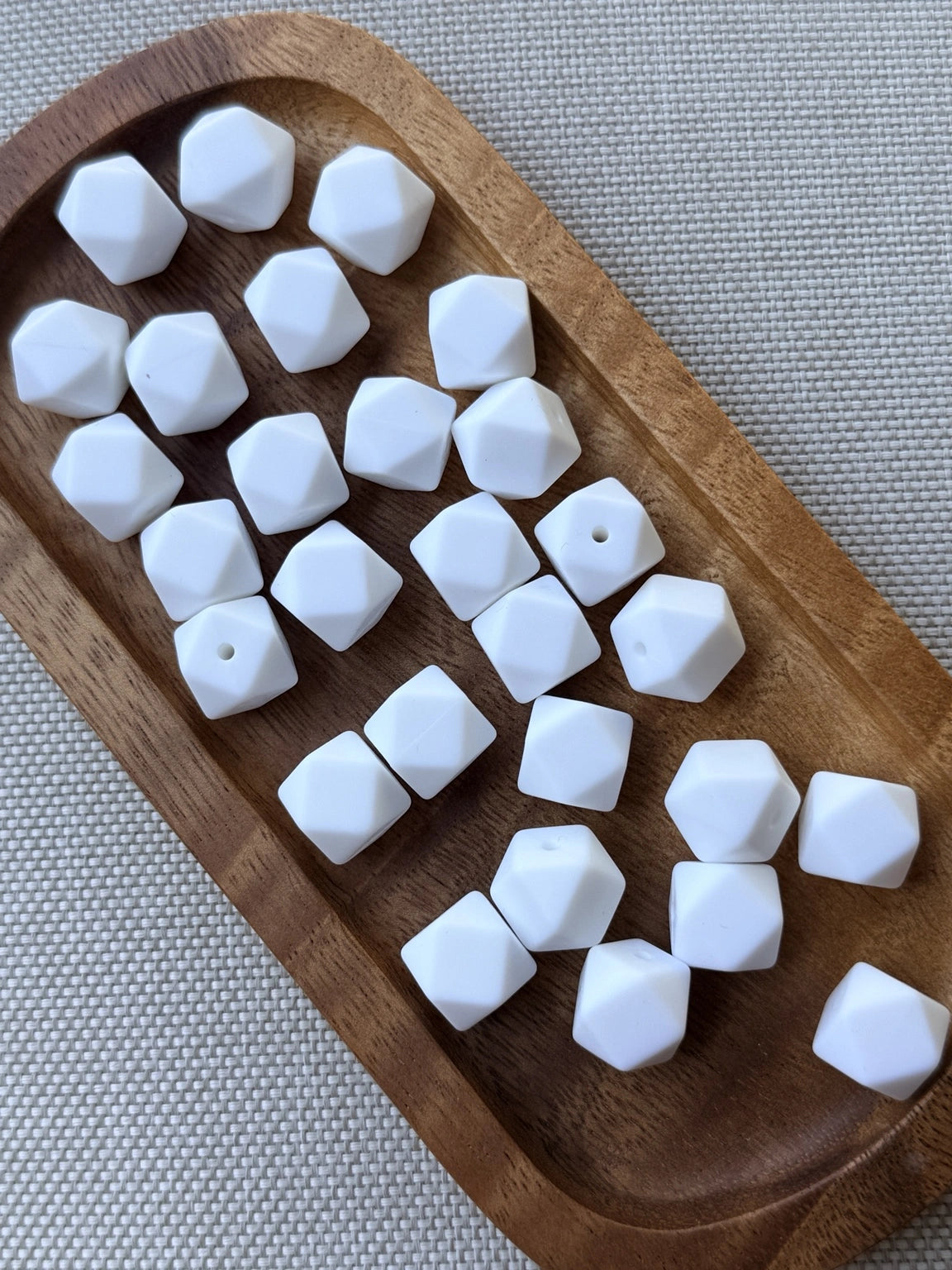 Pure Snow matte white 14mm silicone hexagon beads with a faceted geometric design. Premium silicone craft beads available in 5 or 10 count bags for beaded pens, keychains, wristlets, badge reels, and DIY craft projects.