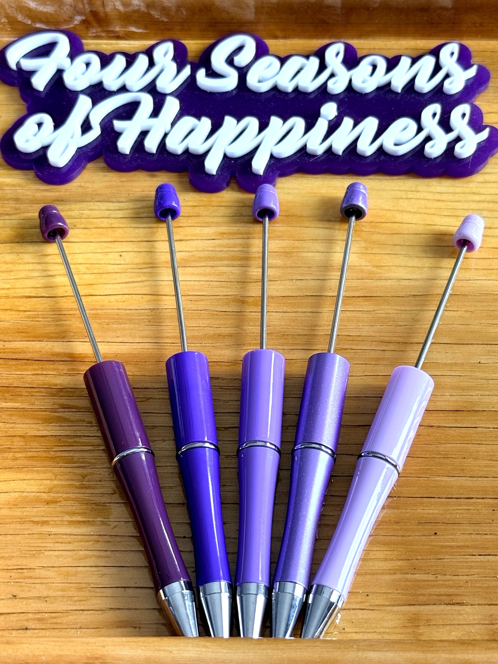 Purple beadable pens from Four Seasons of Happiness for DIY beaded pen crafting with silicone beads and customizable pen bases