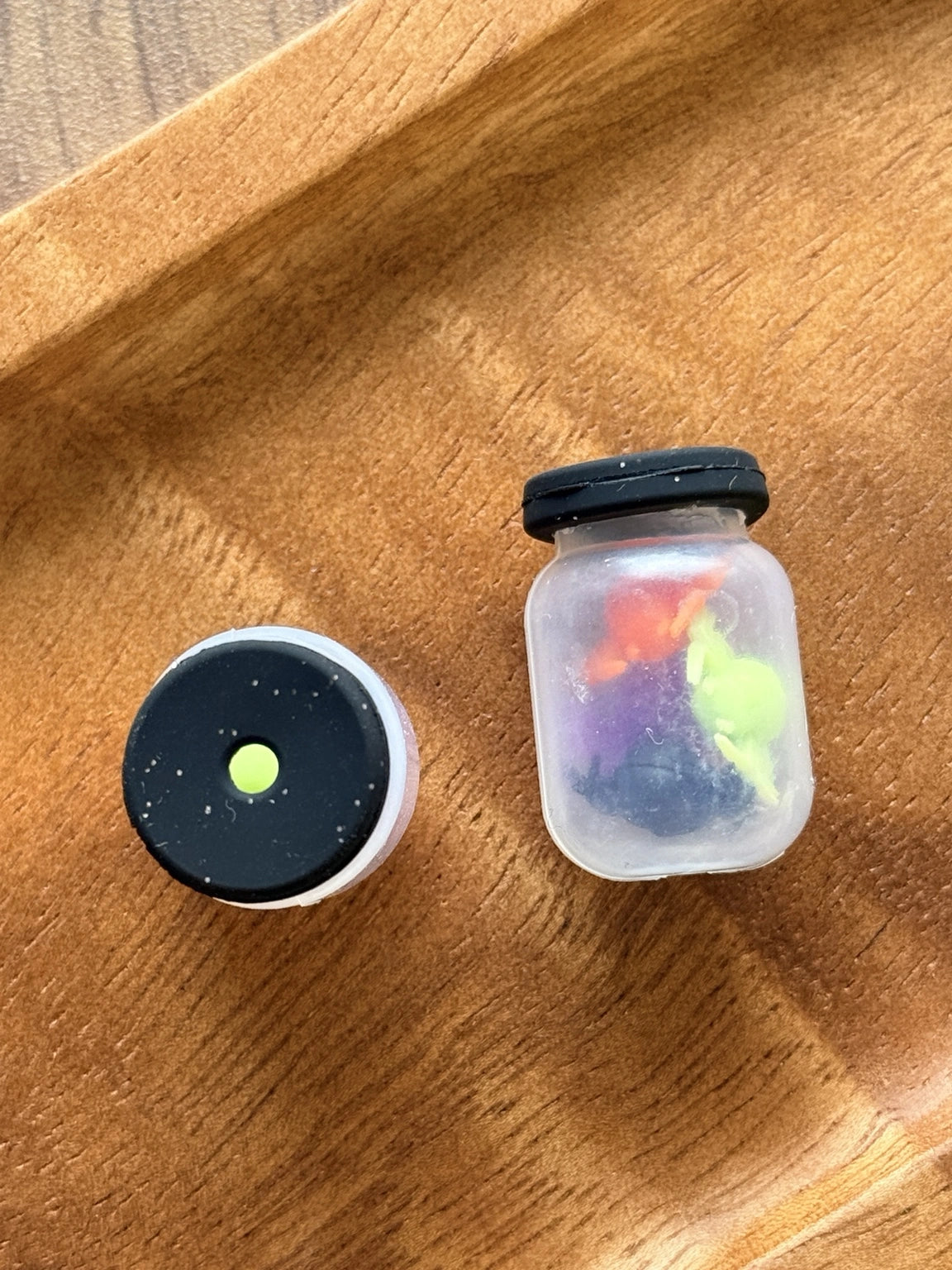 3D Spooky Specimens silicone focal bead from Four Seasons of Happiness featuring a miniature specimen jar filled with colorful spiders. Premium Halloween silicone focal bead sold individually for beaded pens, keychains, wristlets, badge reels, and spooky DIY craft projects.