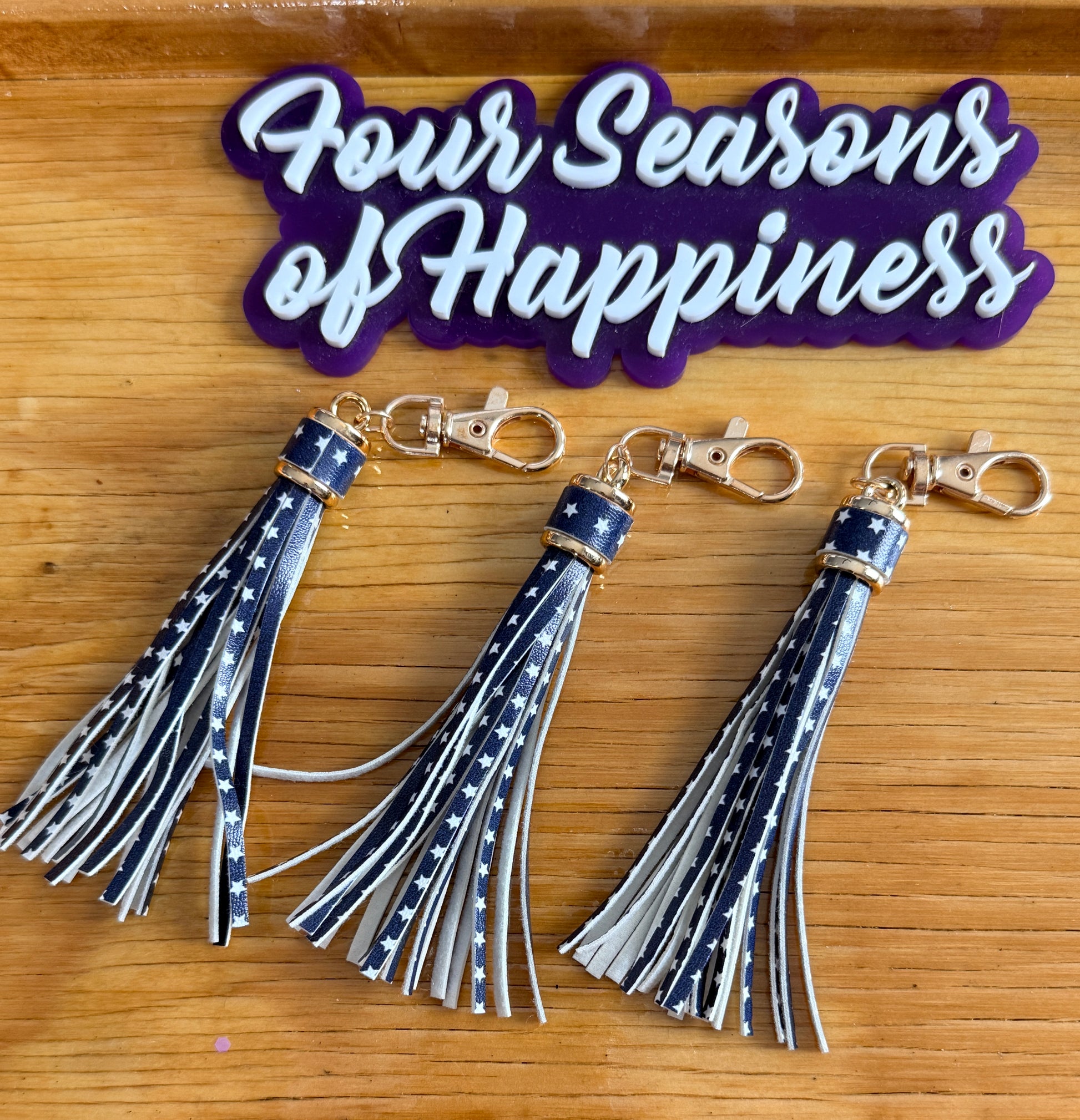 Star print faux leather tassel keychain charm from Four Seasons of Happiness with gold hardware for keychains, wristlets, and DIY craft accessories