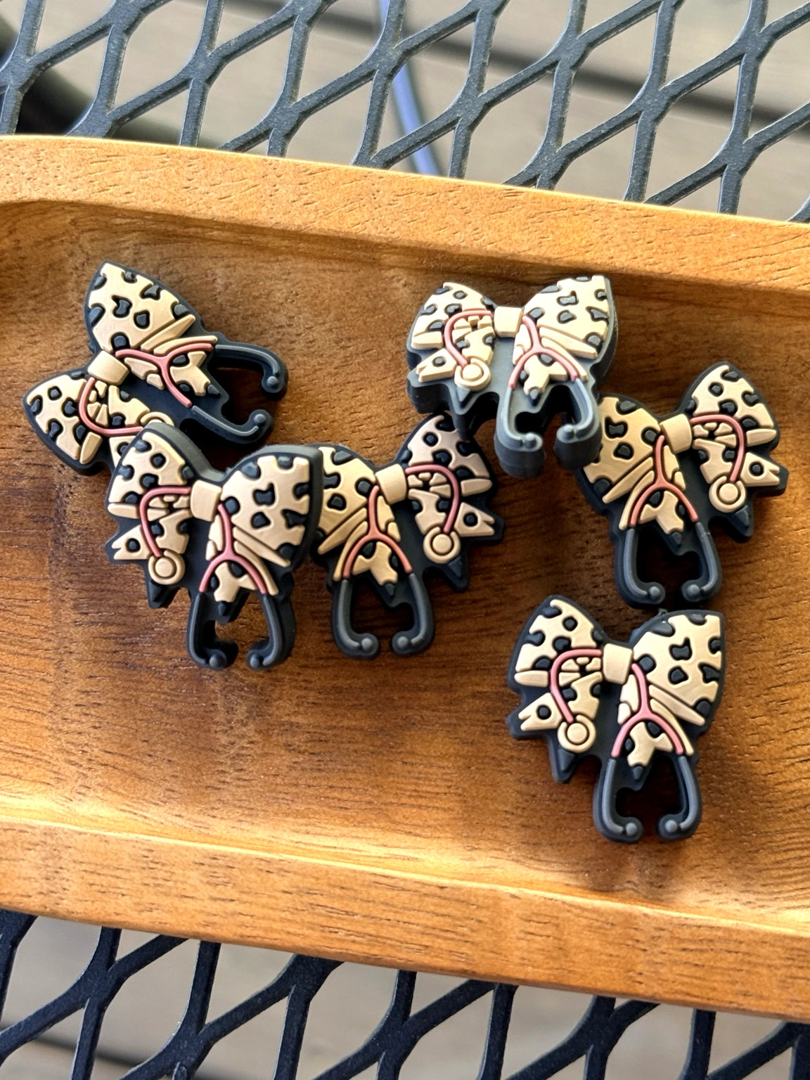 leopard print nurse bow silicone focal beads with pink stethoscope accents for beadable pens, badge reels, keychains, and medical DIY crafts