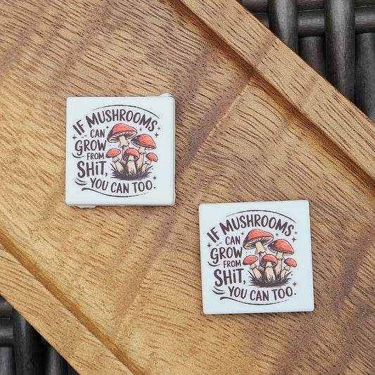 Funny inspirational mushroom silicone focal bead featuring the saying “If Mushrooms Can Grow From Sh*t, You Can Too.” Perfect for beadable pens, keychains, wristlets, badge reels, bookmarks, and DIY craft projects.