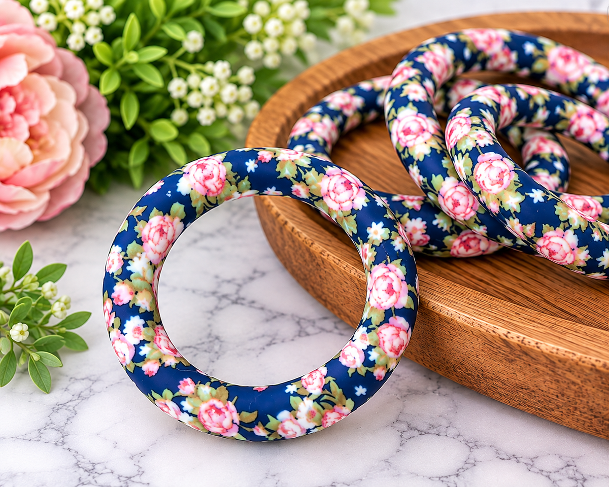 Midnight Rose Garden 65mm navy silicone ring bead with pink rose and green floral print from Four Seasons of Happiness