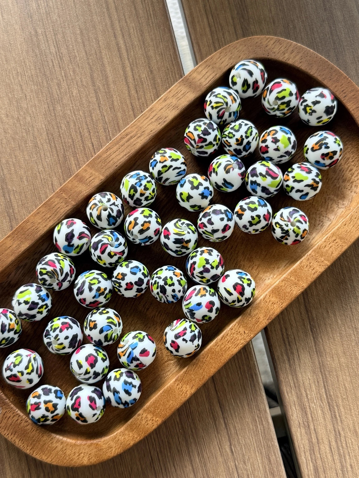Colorful Neon Safari 15mm printed silicone round beads featuring bright leopard print patterns for beadable pens, keychains, wristlets, and DIY crafts  