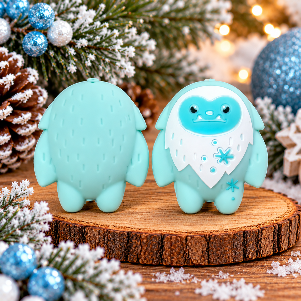 Pastel blue winter yeti silicone focal bead with turquoise face, white chest and snowflake accents