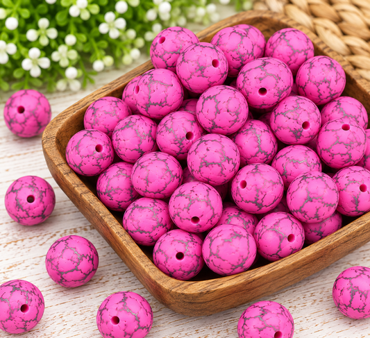 Vibrant pink and gray crackle-patterned 15mm silicone beads arranged in a decorative bowl, ideal for handmade wristlet keychains, bag charms, and DIY crafts.