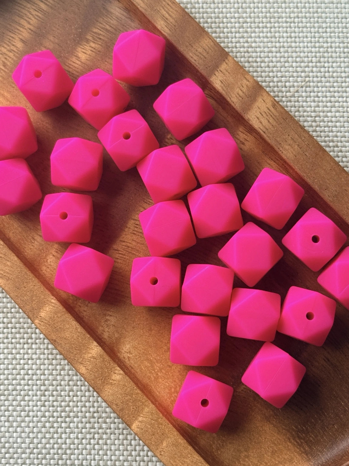 Pink Paradise 14mm hot pink silicone hexagon beads with geometric faceted shape, available in 5 or 10 count bags for keychains, wristlets and crafts.