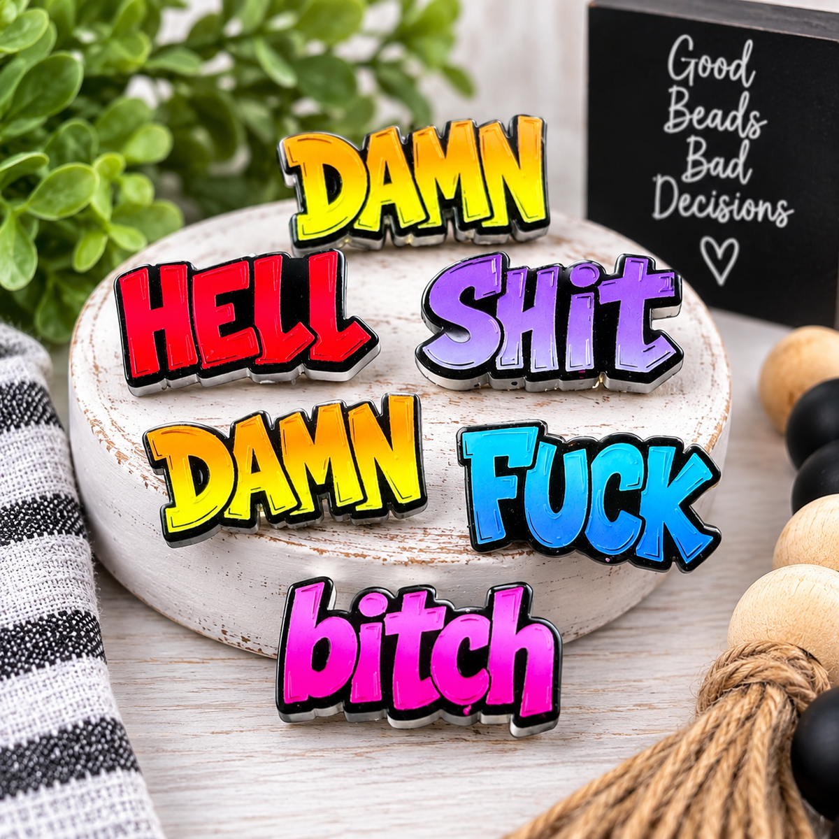 Six colorful adult word acrylic focal beads featuring bold statement lettering in yellow, red, purple, blue and pink for DIY crafts.
