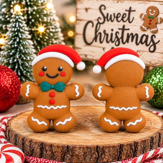 Sir Ginger Snickerdoodle Christmas gingerbread man silicone focal bead featuring a red Santa hat, teal bow tie, red buttons, rosy cheeks, and white icing details, sold individually.