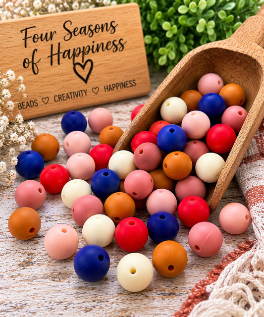 Sunset Serenity 60-count 15mm silicone bead mix featuring Sapphire Tide, Cherry Pop, Rosewood Bloom, Terracotta Trail, Peach Blossom and Buttercup Bloom.