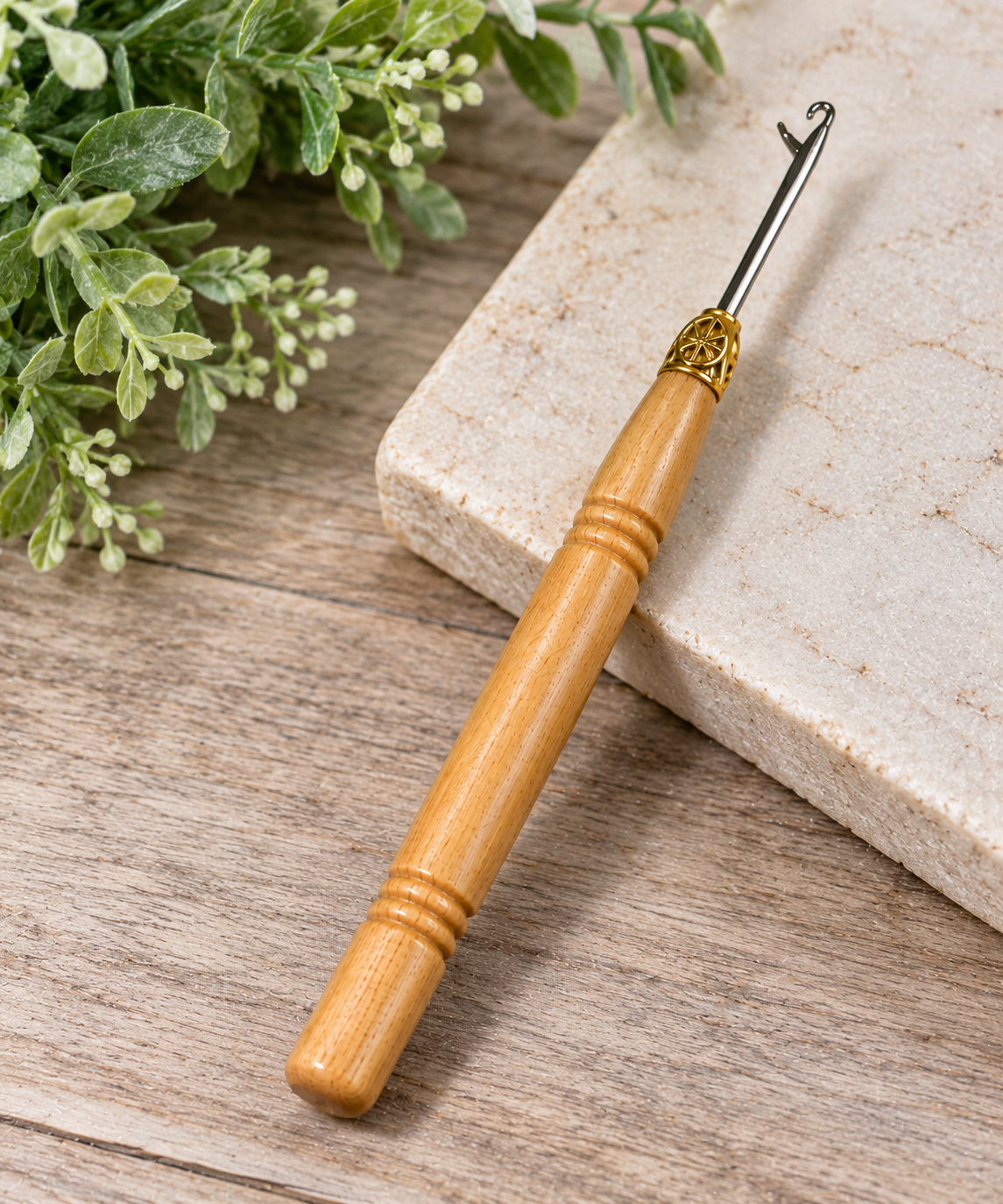 Wood handle needle hook tool featuring a natural wooden grip, decorative gold-tone collar, and curved silver metal hook for beading, jewelry making, and DIY crafts.